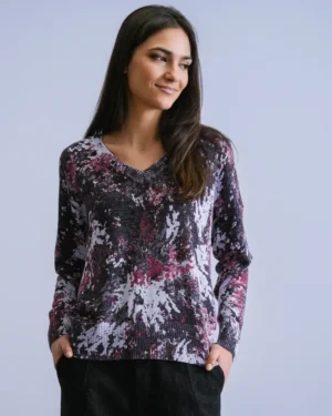 Jersey jaspeado sobre rosas y morados